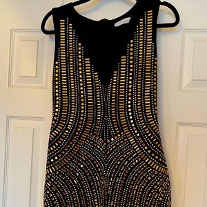 Embellished body con mini dress